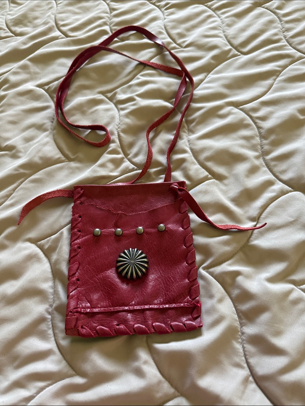 It’s a Pucci Not a Gucci! 
Red Leather Crossbody Pouch with Concho Accent